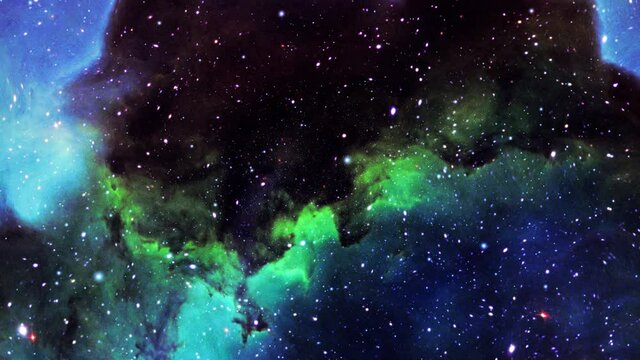 The universe with blue nebula clouds is moving closer