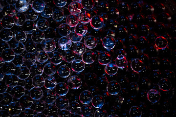 Background from small transparent hydrogel balls illuminated with blue and red light