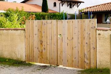Brown wood natural gate of private house suburb wooden portal door homemade