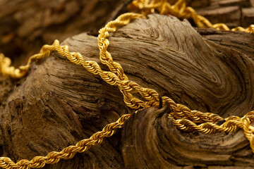 gold chain necklace on the tree