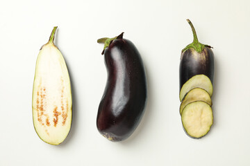 Fresh eggplants on white background, top view
