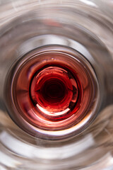 Red wine inside the bottle. Concept of alcoholic drink. Close-up view.