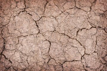 Top view cracked red soil ground Earth for texture natural abstract background