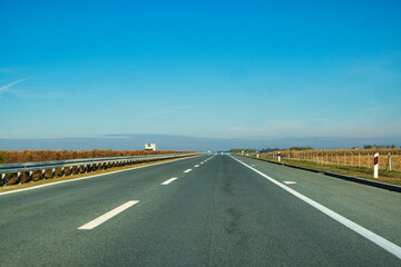 Empty asphalt highway road to the sky