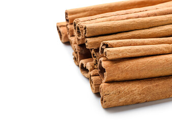 Cinnamon sticks on white background, closeup