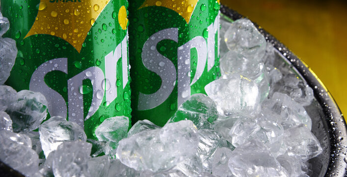 Two cans of carbonated soft drink Sprite.