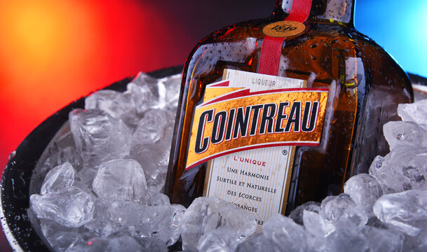 Bottle of Cointreau triple sec in bucket with crushed ice