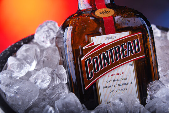 Bottle of Cointreau triple sec in bucket with crushed ice