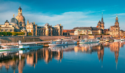 Obraz na płótnie Canvas Amazing Dresden city skyline at Elbe river and Augustus bridge at sunrise, Dresden, Saxony, Germany