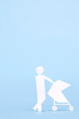 ペーパークラフトのベビーカーを押す人