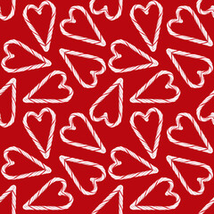 watercolor Christmas seamless pattern. Hand painted candy canes on red background.
