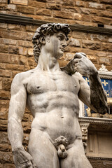 Closeup of Statue of the David by Michelangelo Buonarroti, masterpiece of Renaissance sculpture in Piazza della Signoria, Florence downtown, Tuscany, Italy, Europe