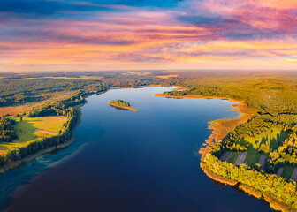 Breathtaking sunset on Krymne Lake. Picturesque view from flying drone of Shatsky National Park, Volyn region, Ukraine, Europe. Beauty of nature concept background.