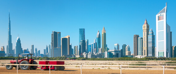 Dubai city at sunrise - modern city center skyline with luxury skyscrapers, United Arab Emirates