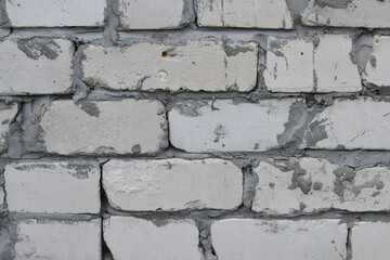 Texture of an old white brick wall with cement mortar. Background of silicate brick in the form of brick masonry of rectangular.