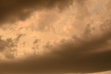 Dramatic thunder storm clouds at dark sky