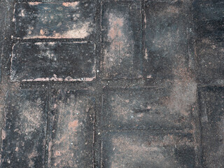 Obraz premium Old cement ground turned black cover with dirt