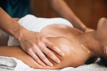 Fototapeta na wymiar Ayurvedic Shoulders Massage with Ethereal Oils