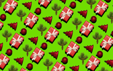Christmas pattern of fir branches, boxes in red paper and Christmas balls on a green background. Christmas background. Christmas seamless pattern