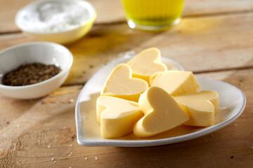 Elegant heart-shaped butter pats with ingredients