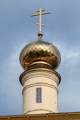 Golden cupola with cross of Tikhvin Cathedral