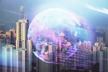 Double exposure of technology theme hologram and cityscape background. Concept of Hightech.