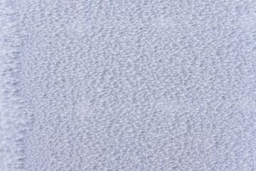 Surface covered with white frost, winter background