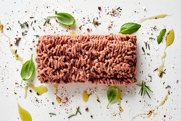 Block of raw vegan mince meat with herbs - obrazy, fototapety, plakaty