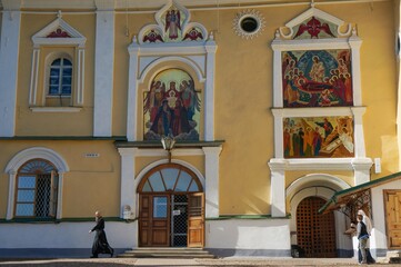 Pechory. Holy Dormition Pskov-Pechersky Monastery. Assumption Church. Entrance to the temple of icons and frescoes of saints