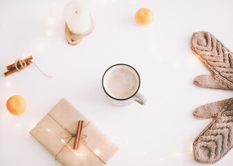 Christmas background. Gift box with decorations on white background. Christmas and New Year festive composition. Flatlay, top view