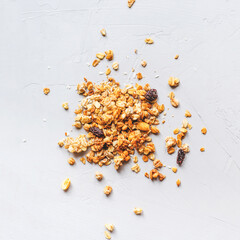 Muesli or granola on gray background. Healthy food concept.
