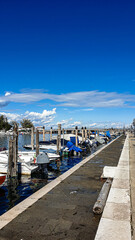 Fishing boats berthed in marina of the Old Town