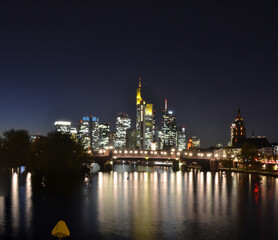 Fototapeta na wymiar Nighttime view of Skyline of Frankfurt on Main, Germany with stars added.