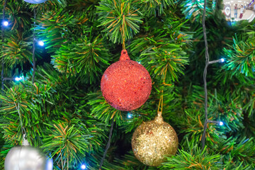 Decorated Christmas tree with red ball New Year holidays background