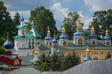  Holy Dormition Pskov-Pechersky Monastery. Domes of the Intercession Church, built over the...