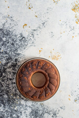 Orange bundt cake on a white background.