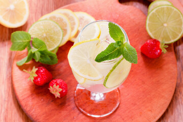Glass of lemonade with mint and ice.