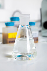 Laboratory or chemistry glassware flask test tube in medical technology research laboratory. Coronavirus or covid-19 vaccine in test tube.