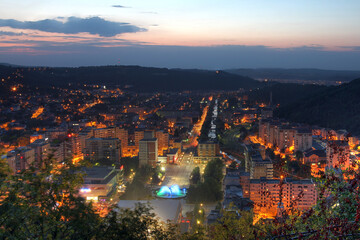 Aerial night view of the town of Resita in Western Romania