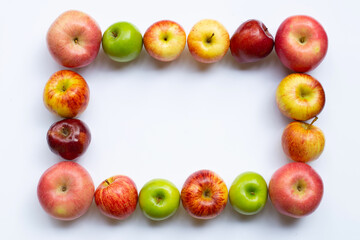 Frame made of apples on white background. Top view