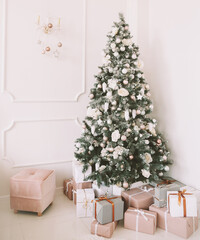 Fototapeta na wymiar Christmas home interior. Christmas tree toys and gifts. New Year home decorations