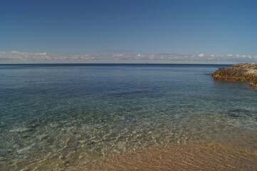 Sunny day in October 2016. Autumn on the coast of Pula, Istria, Croatia. View on Adriatic sea. Rocks.