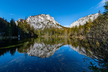 the "Kreuzteich" near the famous "Grüner See / Green lake" an the Pribitz mountain left and the Messnerin mountain right in the "Hochschwab" mountainrange, Styria, Austria on a clear autumn day