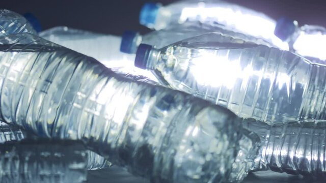 Dolly Shot Of A Pile Of Plastic Bottles With Mineral Water