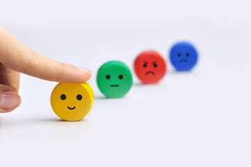A variety of emotions: joy, serenity, anger, sadness on the colored cubes