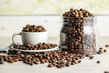 Roasted coffee beans in cup
