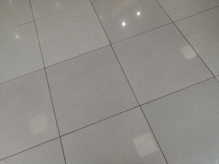 Brown ceramic floor tiles closeup texture. tile, floor tiles
