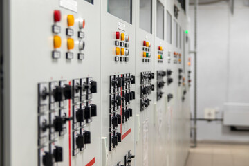 Power distribution device, Industrial power distribution panel for control, safety and protection system of a substation in a power plant. Selective focus.
