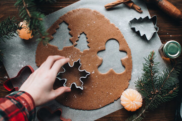 Christmas cookies. Making gingerbread cookies for Holidays. Gingerbread dough. Christmas Baking background. Form for cutting gingerbread. Merry Christmas and Happy Holidays. 