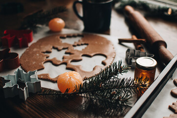 Christmas cookies. Making gingerbread cookies for Holidays. Gingerbread dough. Christmas Baking background. Form for cutting gingerbread. Merry Christmas and Happy Holidays. 